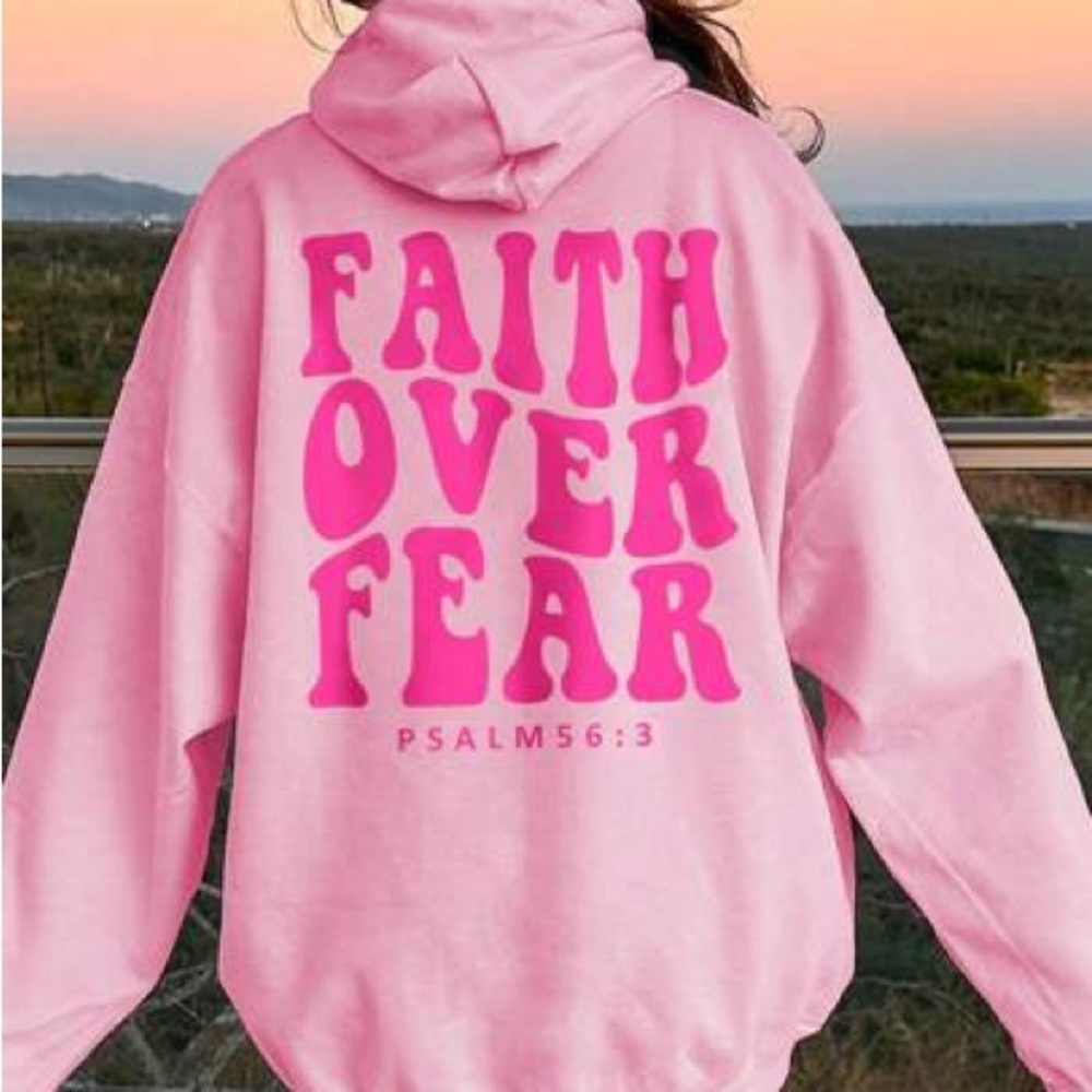 Vibrant Pink Hoodie with Inspiring Text